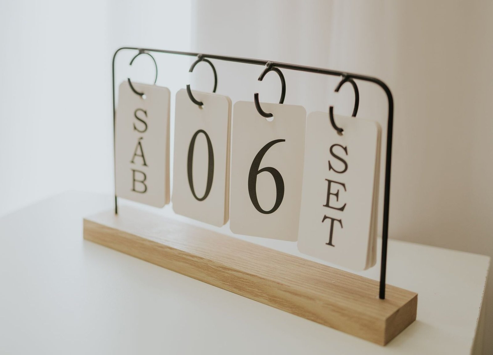 A minimalist desk calendar showing September 6th in soft natural lighting, perfect for office decor inspiration.