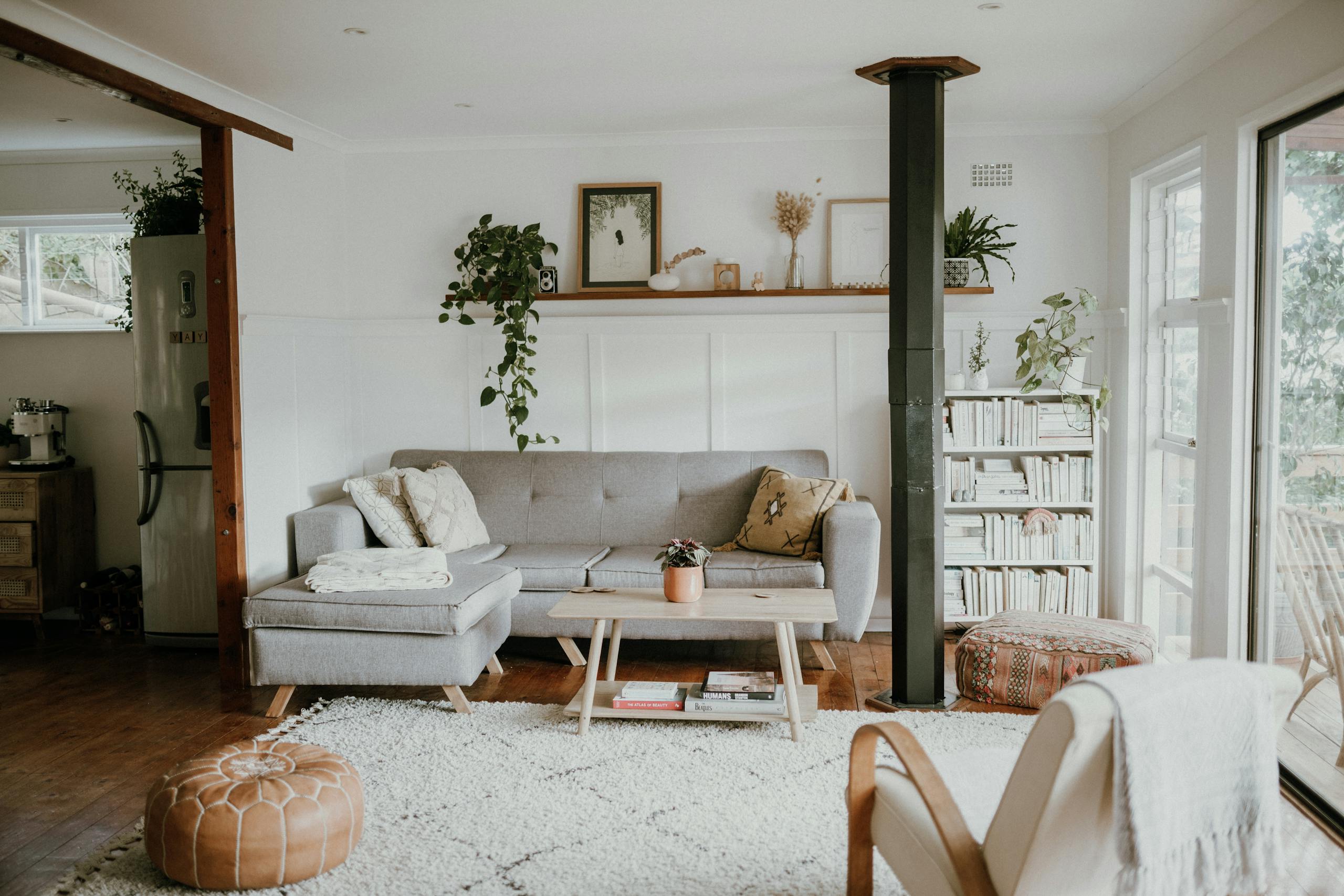 Bright and airy Scandinavian design living room with elegant decor and lush greenery.